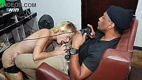 The big black guy plays video games while the little blonde nympho offers her pussy