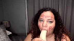 Bbw Colored Girl Deepthroating A Dildo After Writing Dirty Words On Her Whore Face