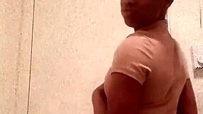 Hey, check out this ebony girl flashing her ass in the bathroom