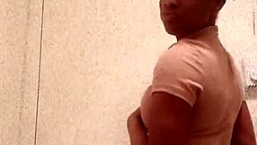 Hey, check out this ebony girl flashing her ass in the bathroom