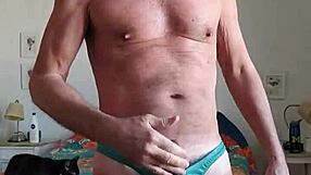 Pervy Daddy Plays with Boner Bulge in Turquoise Thong!
