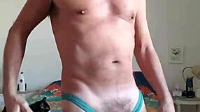 Pervy Daddy Plays with Boner Bulge in Turquoise Thong!