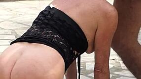 Mature amateurs passionately making love in the garden.