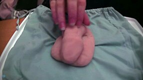 Amateur plays with a soft limp fake toy without audio