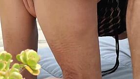 Mature amateurs passionately making love in the garden.