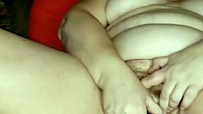 Cumming hard while spreading her wet pussy