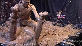 Glamorous Ladies Engage In Messy Mud Wrestling With Big Tits