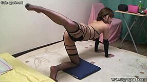 hikaru konno teases in fishnet lingerie on webcam, hidden from view.