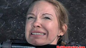 breastbondage sub restrained on sex machine gets anal punished with gagging, caning, leather, and choking close up.