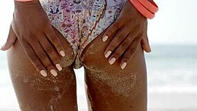 Is that beach hottie in bikini teasing her ass?