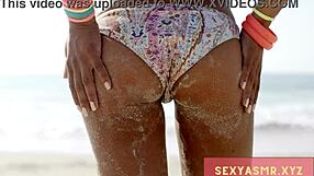 Is that beach hottie in bikini teasing her ass?