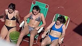 Neighbors sunbathe on the terrace in part two.