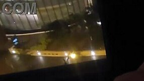 petite teen girlfriend shares intimate fingering close-up in front of hotel window, contrasting public exposure with solo pleasure