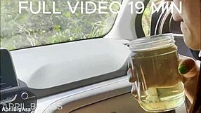 Babe In See-Through Outfit Drinks Piss In Car Fetish Video