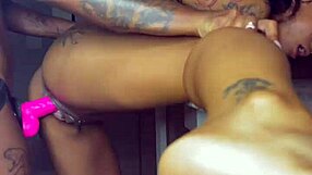 ebony lesbian strap on fun with renity love & majesty nasty in oiled piercing play