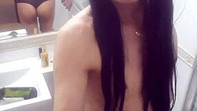 sexy and lovely crossdresser poses in lingerie showing off curves