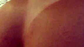 Kalena Mitrak rides dildo in bedroom while talking dirty about wanting double penetration. She squirts in orgasm as husband watches cuckold scene.