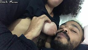 Woman engages in adult breastfeeding session with licking and milking of natural tits.