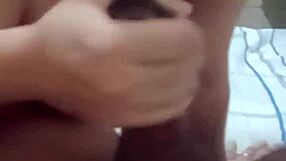 Escort Whispers to Husband About Her Day While Giving Him a Handjob