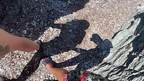 horny couple sneaks a quick doggystyle fuck on the beach