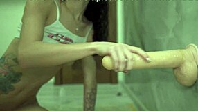 Tattooed cutie boldly sucks lollipop rides massive dildo and fucks hard to explosive orgasm