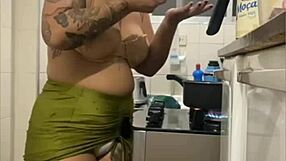 I go live in the kitchen wearing a mini skirt to show off my swollen curves.