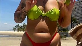 Wow, married babe draws eyes on the beach flashing in her tiny bikini!