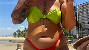 Wow, married babe draws eyes on the beach flashing in her tiny bikini!