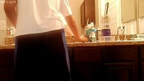 In the bathroom, someone was handling general tidying up as part of house chore work