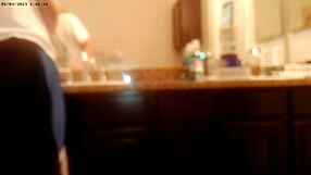 In the bathroom, someone was handling general tidying up as part of house chore work