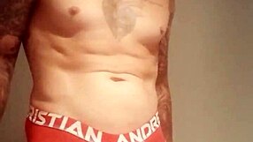He pulls out his massive tattooed cock for a solo homemade masturbation session.