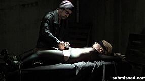 bound whore struggles in suspension while enduring intense humiliation and spanking with toys