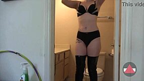 Wow, watch this hot brunette drying her hair in boots then bending over to show that big ass view?