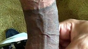 Detailed view of massive big black cock from Twitter user Carameldick in amateur solo masturbation. Monster size shines in close-up action.