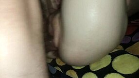 My girlfriend applies lube to my penis for better rough penetration in homemade sex.