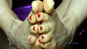 Sweat-covered small 18+ feet mistress with red toenail polish dominates sensually