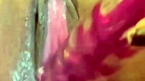 The tattooed temptress at 19 explores her desires with a red rose