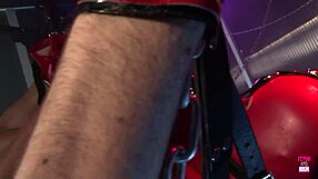 Two brunettes bound in latex ride strapons and hard cock together