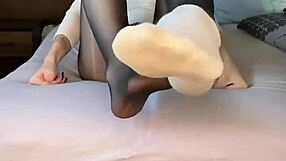 hey, check out this black nylon feet fetish with nike air force tights on that girl