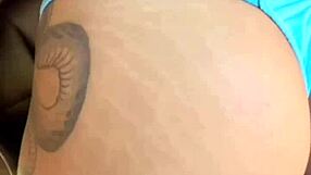 The tattooed temptress at 19 explores her desires with a red rose