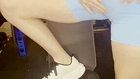 Sexy horny milf starts fingering her natural tits and wet pussy solo in the gym. She fucks herself hard with dildo during workout