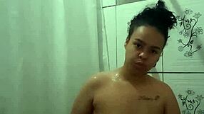 Brunette Latina Teen Takes Steamy Shower and Fingers Wet Pussy in Close-Up POV