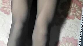 Hey, check out this crossdresser in black pantyhose and short jeans