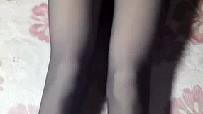 Hey, check out this crossdresser in black pantyhose and short jeans