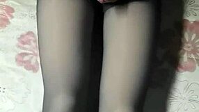 Hey, check out this crossdresser in black pantyhose and short jeans