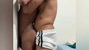 Amateur skinny Brazilian dominated by black partner thrusting hard against wall in forceful domination scene