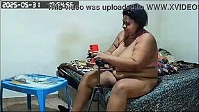 Camera catches stepmom with big assets showing off in lingerie