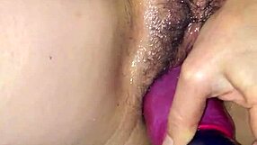 Whoa, shoving that fake cock into her swollen pussy!