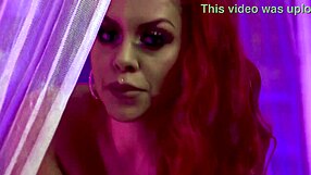 Busty curvy redhead with big tits and pierced nipples delivers a smoking hot close-up seduction.