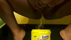 Ebony athlete tries out water sports. She explores the kinky old fetish in a fun session.